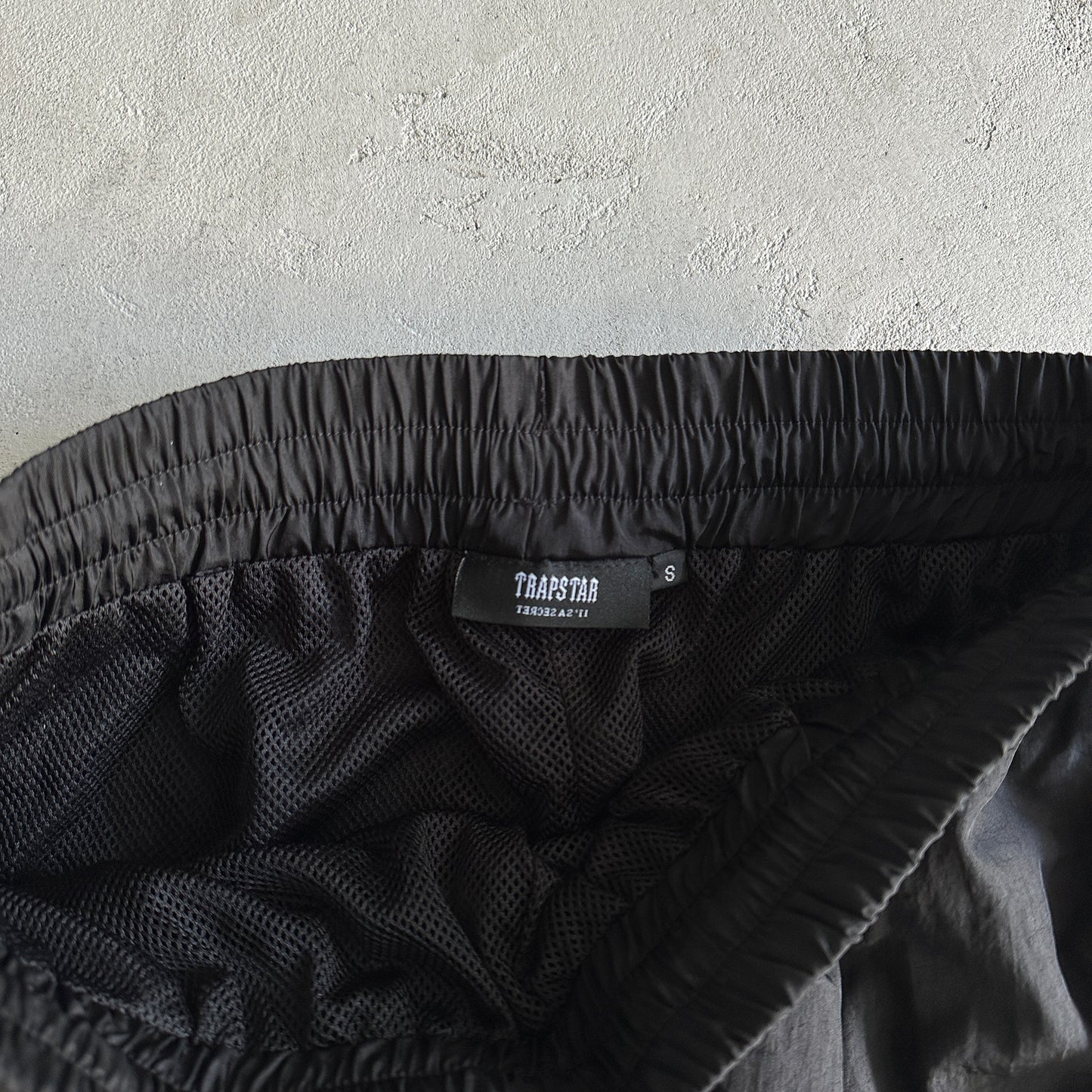 Conjunto Trapstar Football Shellsuit “Black”