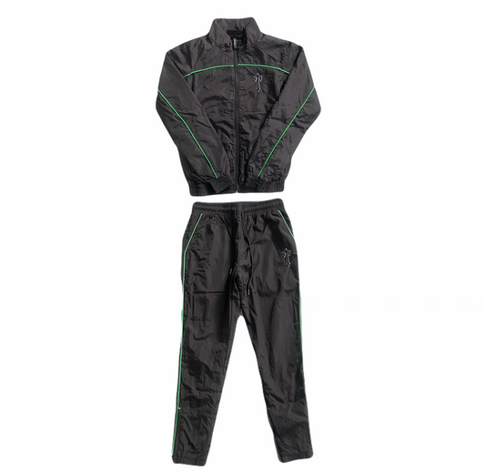 Conjunto Trapstar Shellsuit “Black Green”