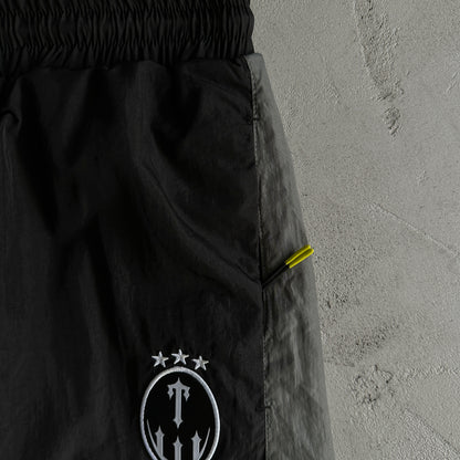 Conjunto Trapstar Football Shellsuit “Black”