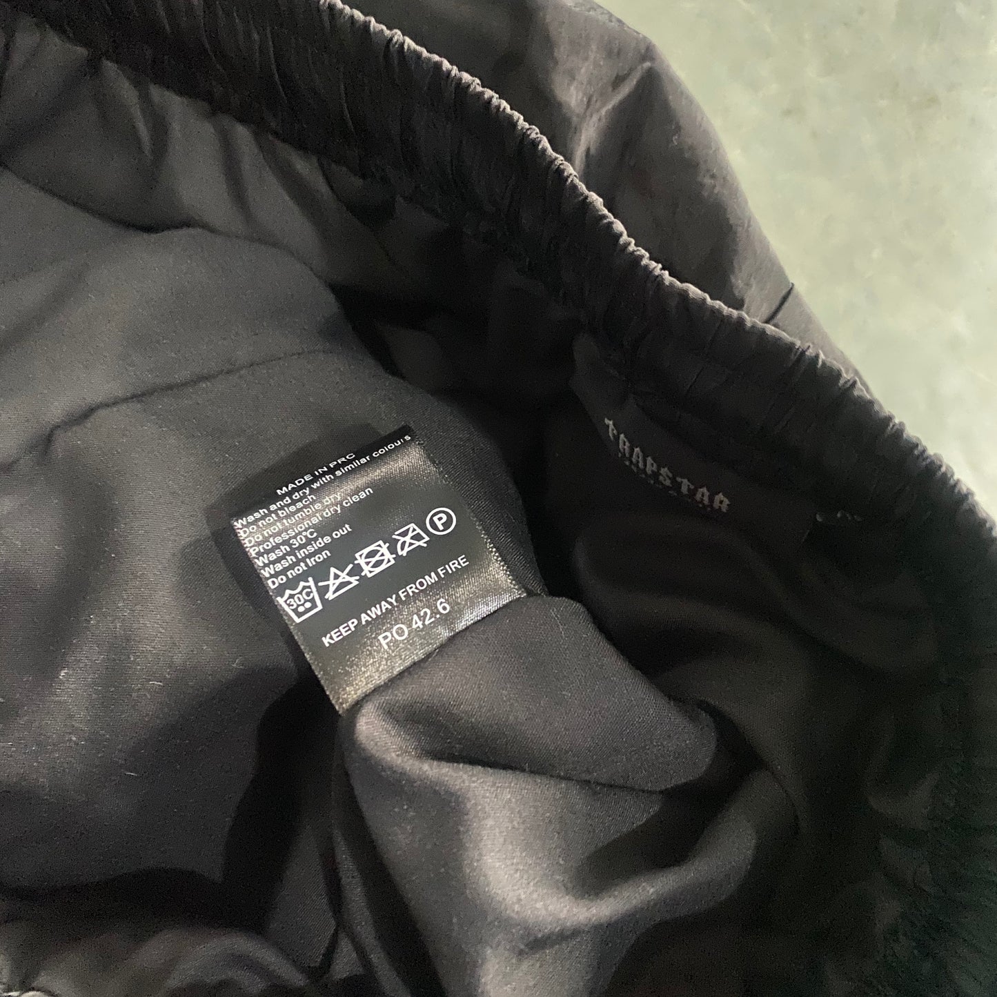 Conjunto Trapstar Shellsuit “Black”