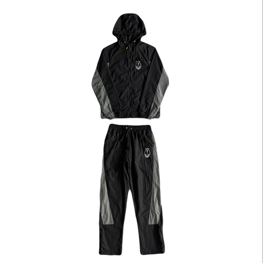 Conjunto Trapstar Football Shellsuit “Black”
