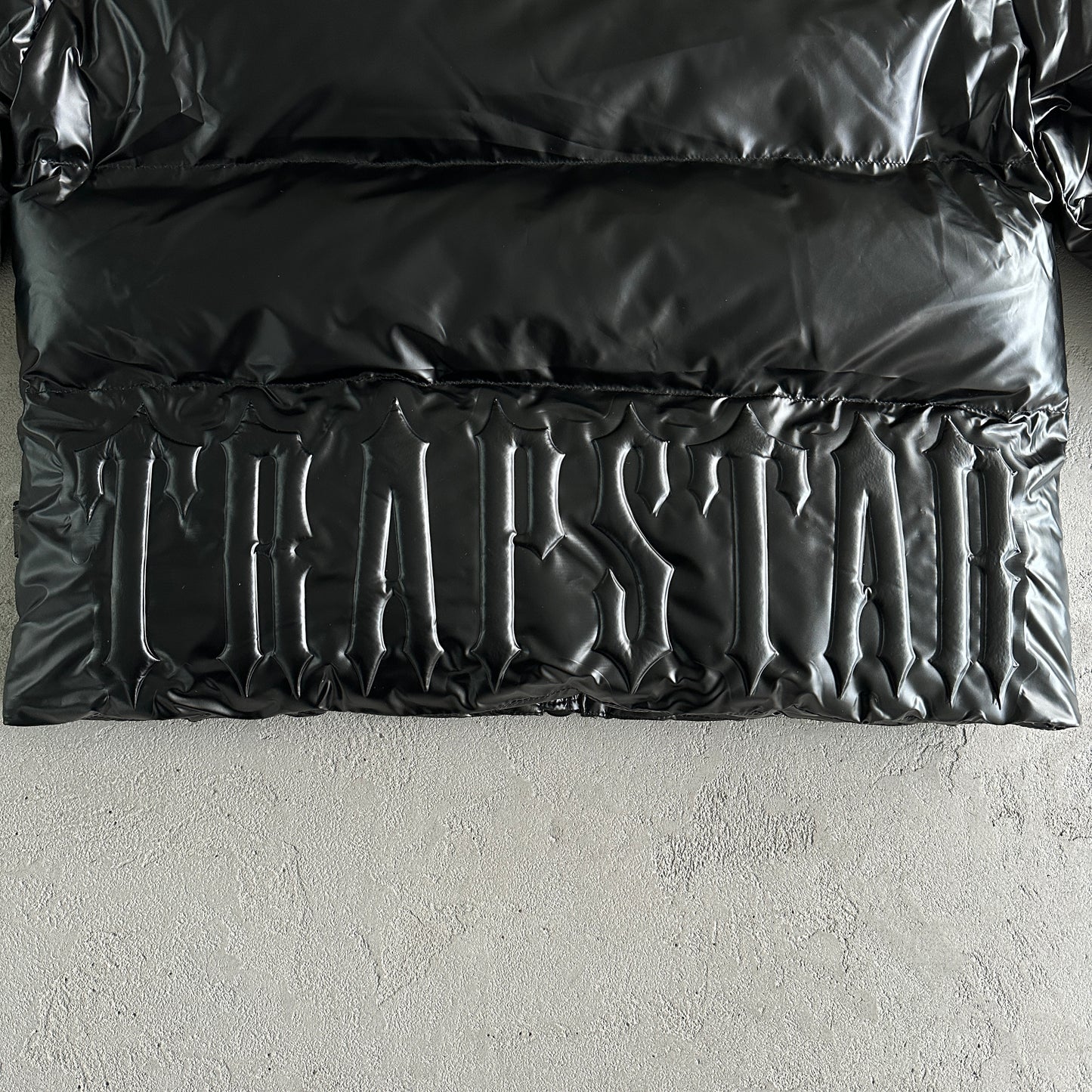 Trapstar Embossed Puffer Jacket “Black”