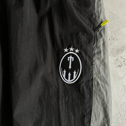 Conjunto Trapstar Football Shellsuit “Black”