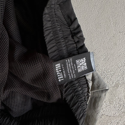 Conjunto Trapstar Football Shellsuit “Black”