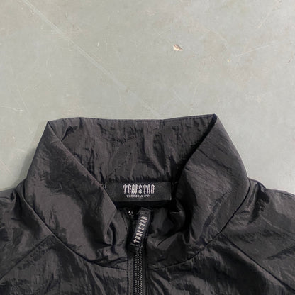 Conjunto Trapstar Shellsuit “Black Green”