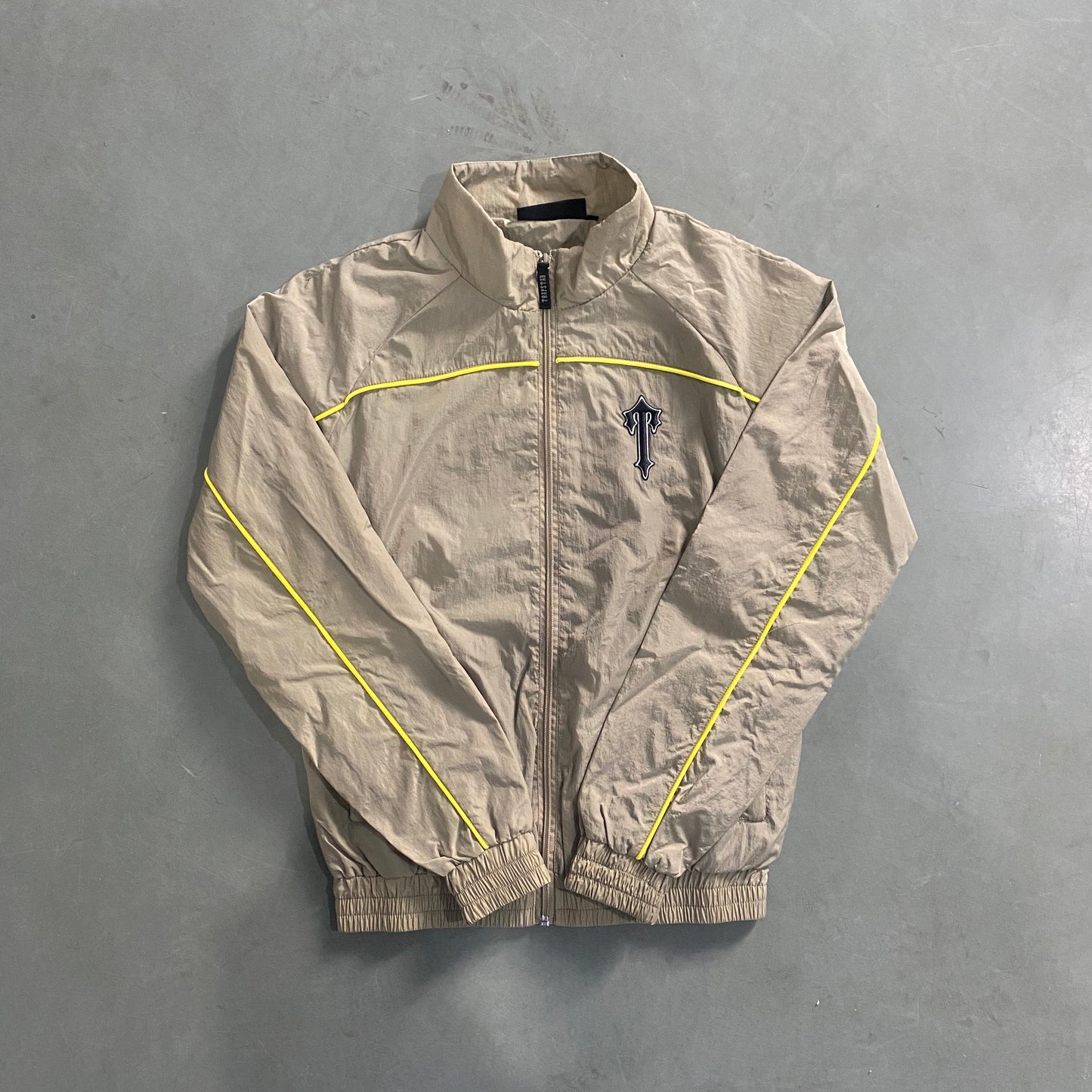 Conjunto Trapstar Shellsuit “Beige”