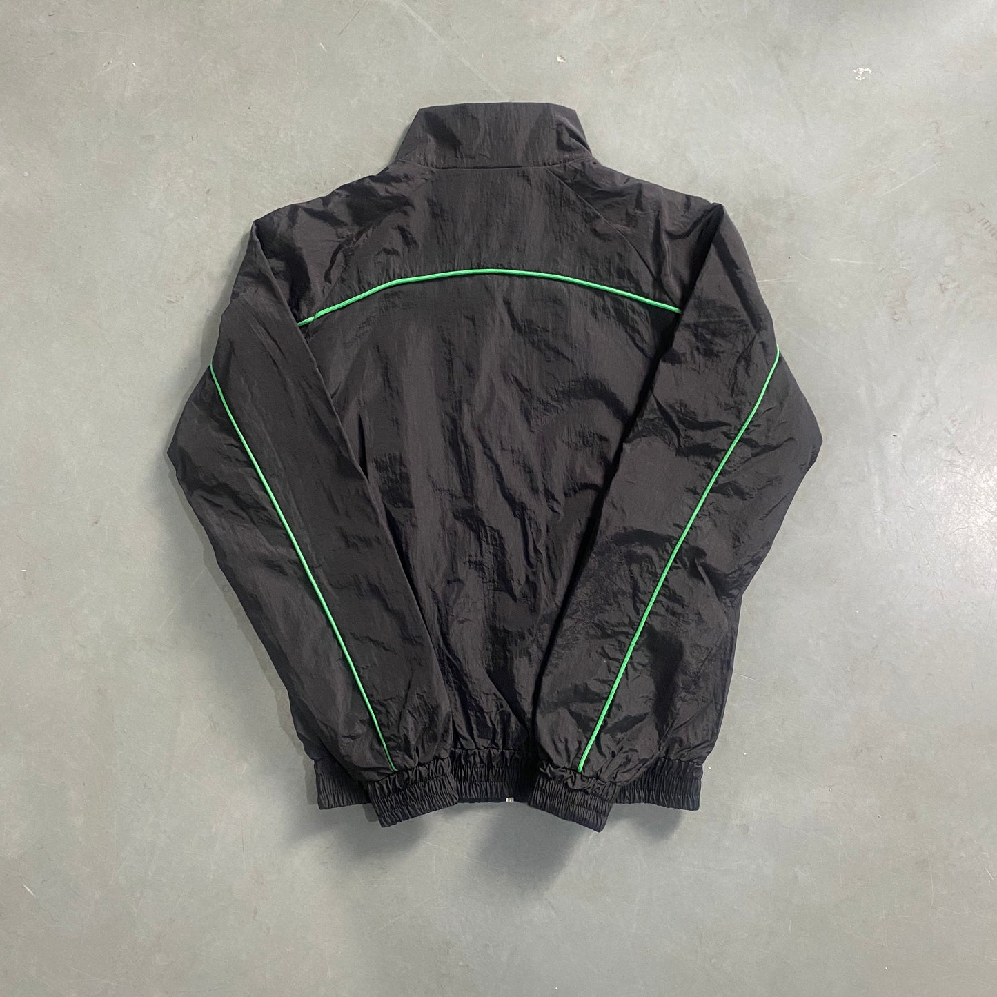 Conjunto Trapstar Shellsuit “Black Green”