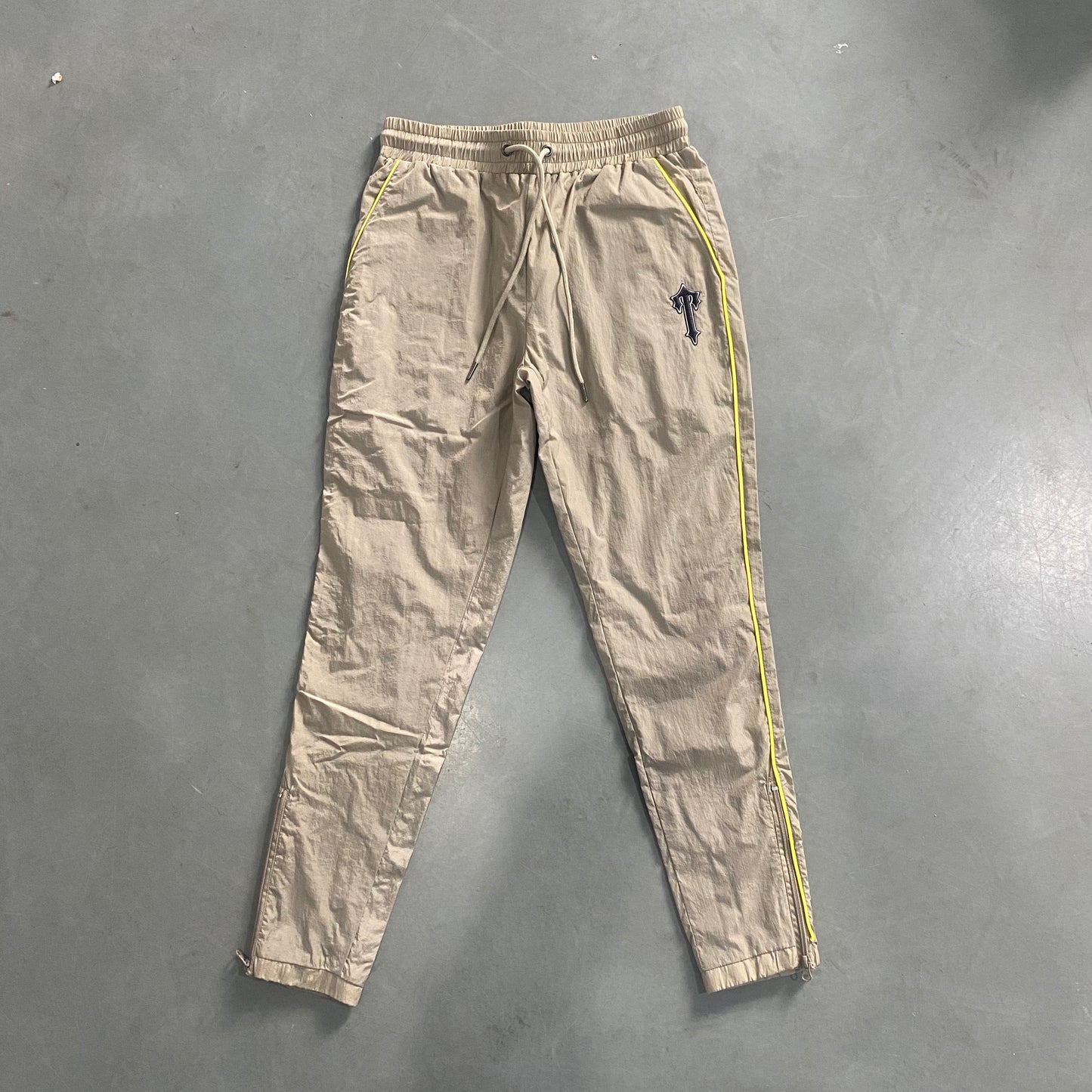 Conjunto Trapstar Shellsuit “Beige”