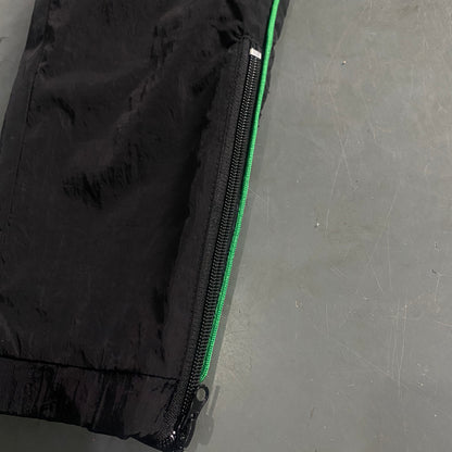 Conjunto Trapstar Shellsuit “Black Green”
