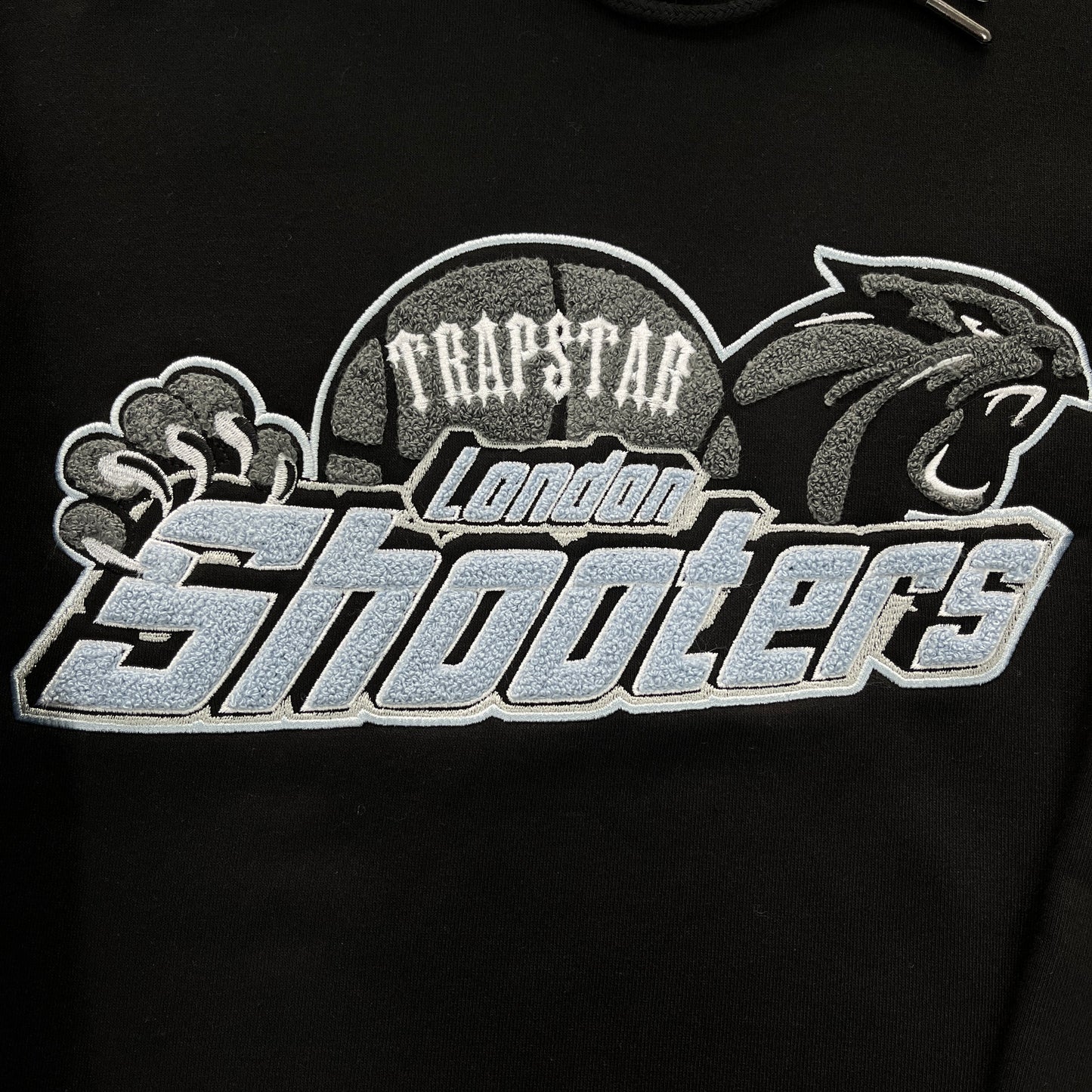Trapstar “Shooters Hooded BLACK SKYBLUE”