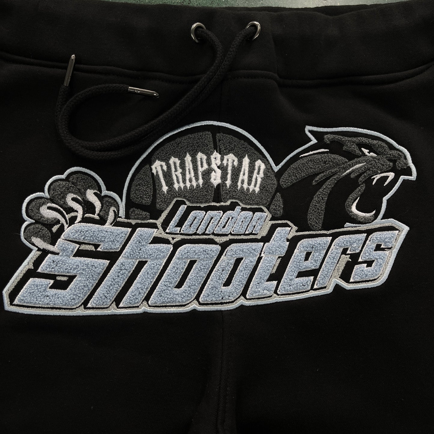 Trapstar “Shooters Hooded BLACK SKYBLUE”