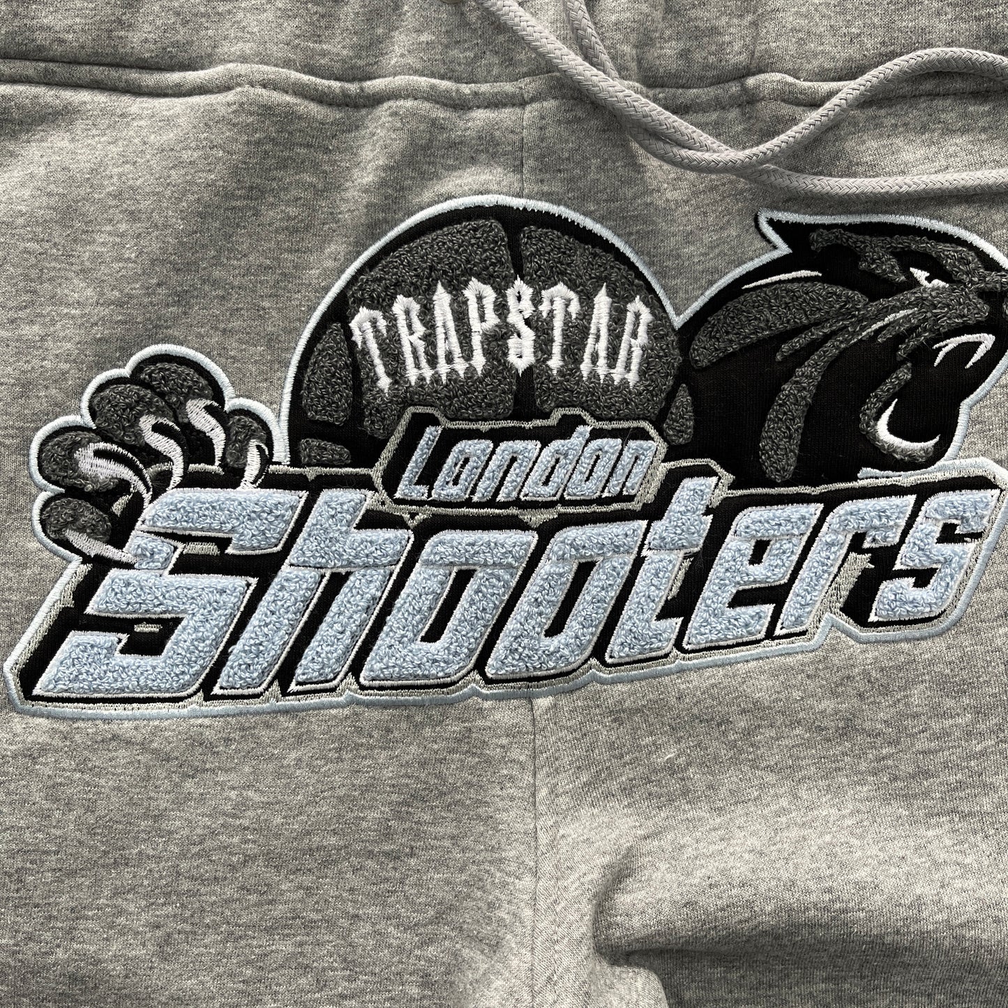 Trapstar “Shooters Hooded BLACK SKYBLUE”
