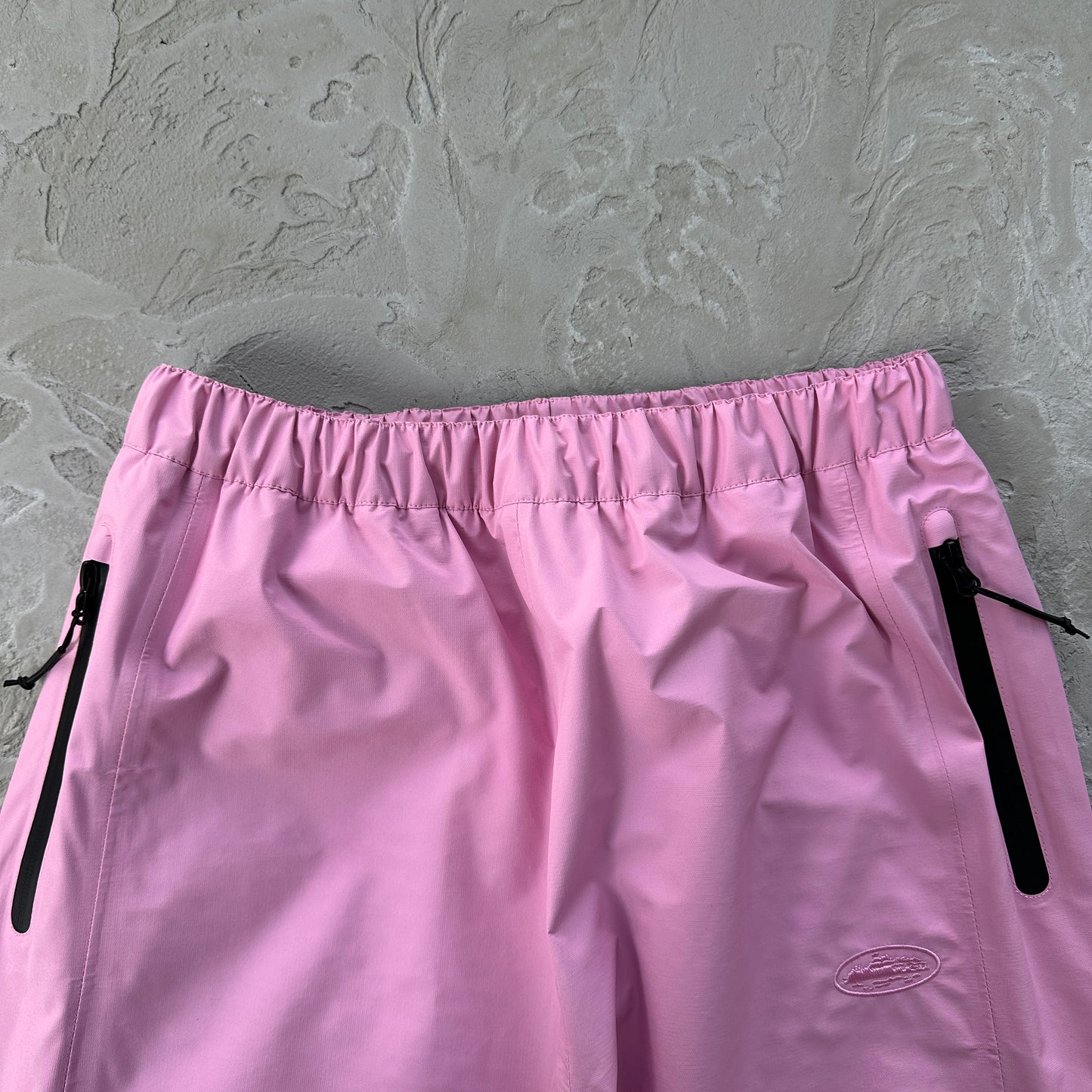 Corteiz Elitework Waterproof Shell Pants “Pink”