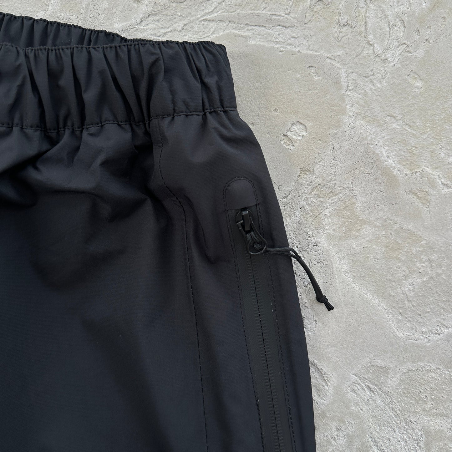 Corteiz Elitework Waterproof Shell Pants “Black”