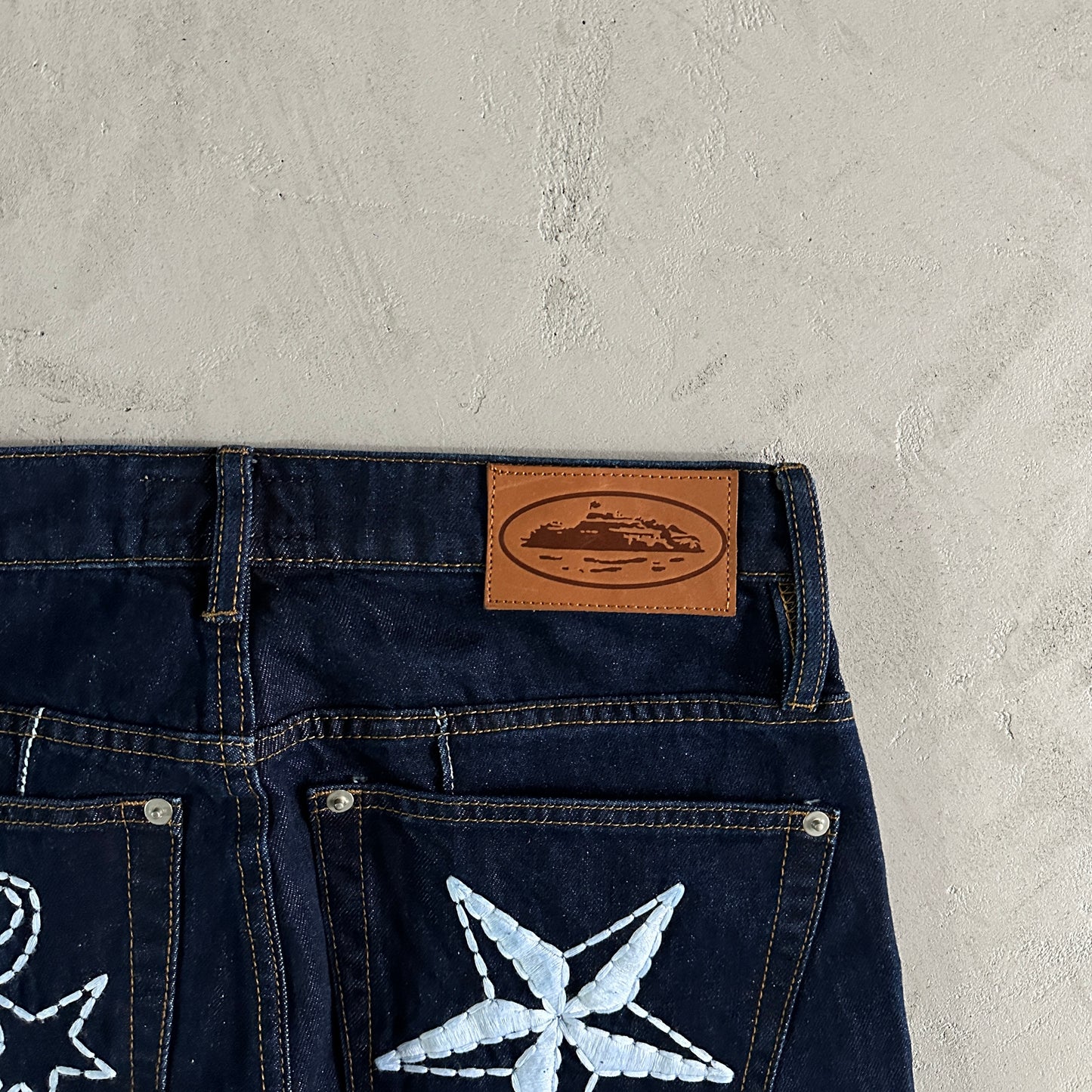 Corteiz Star Denim Pants “Dark Wash”