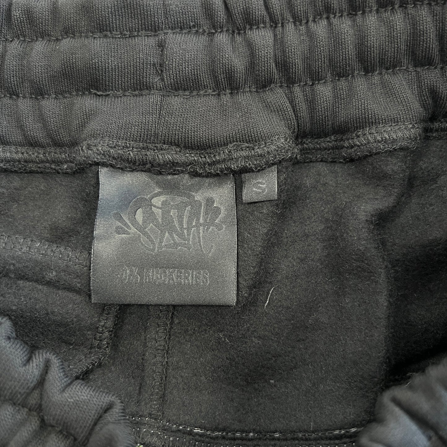 Syna World Short “Black Grey”