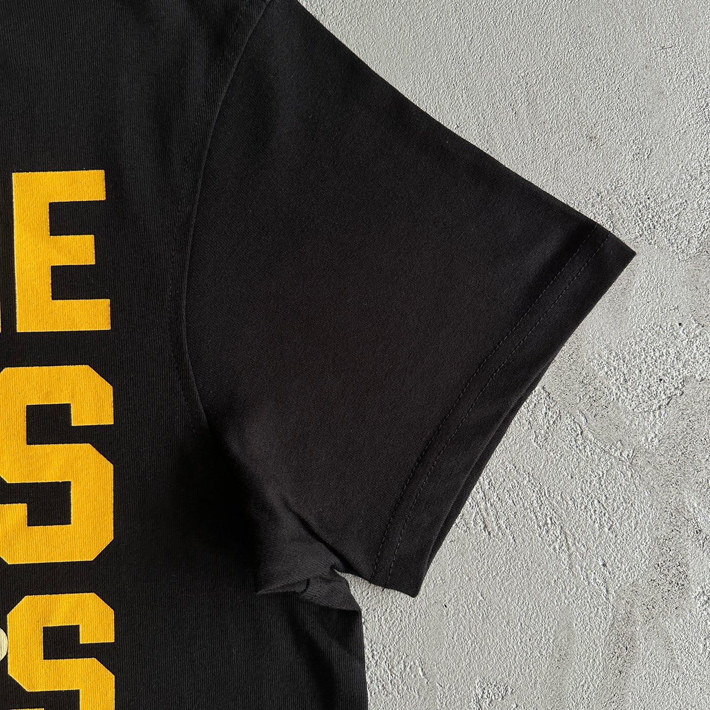 Syna World Wages Tee “Black”