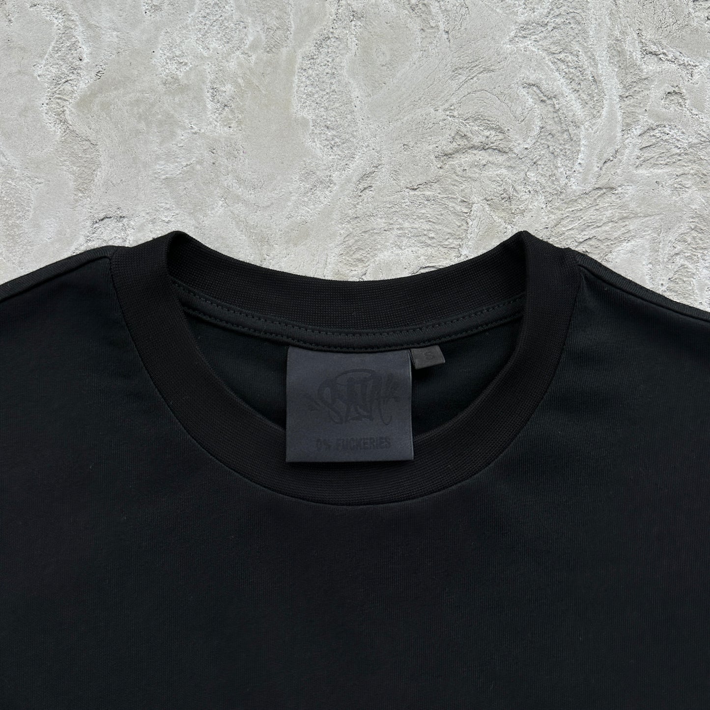 Syna World x Nemzzz Rents Due Tee “Black”