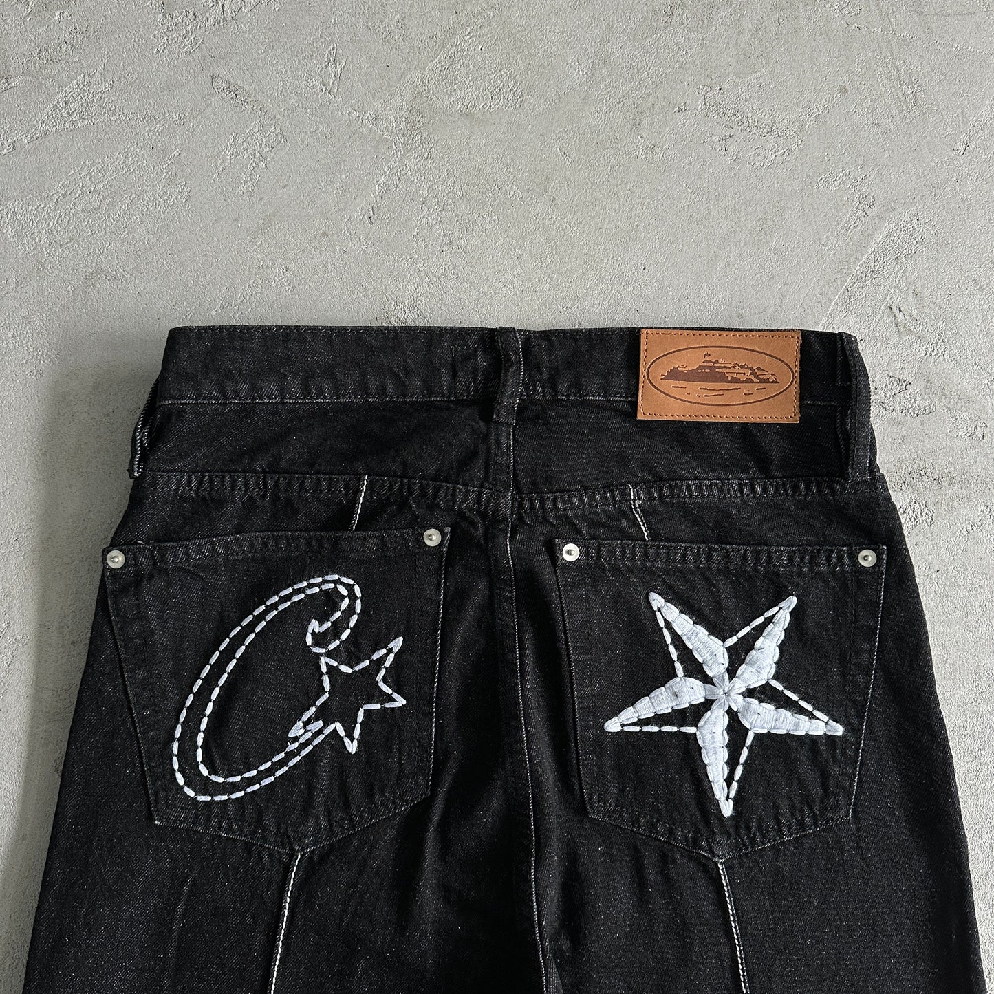 Corteiz Star Denim Pants “Dark White”