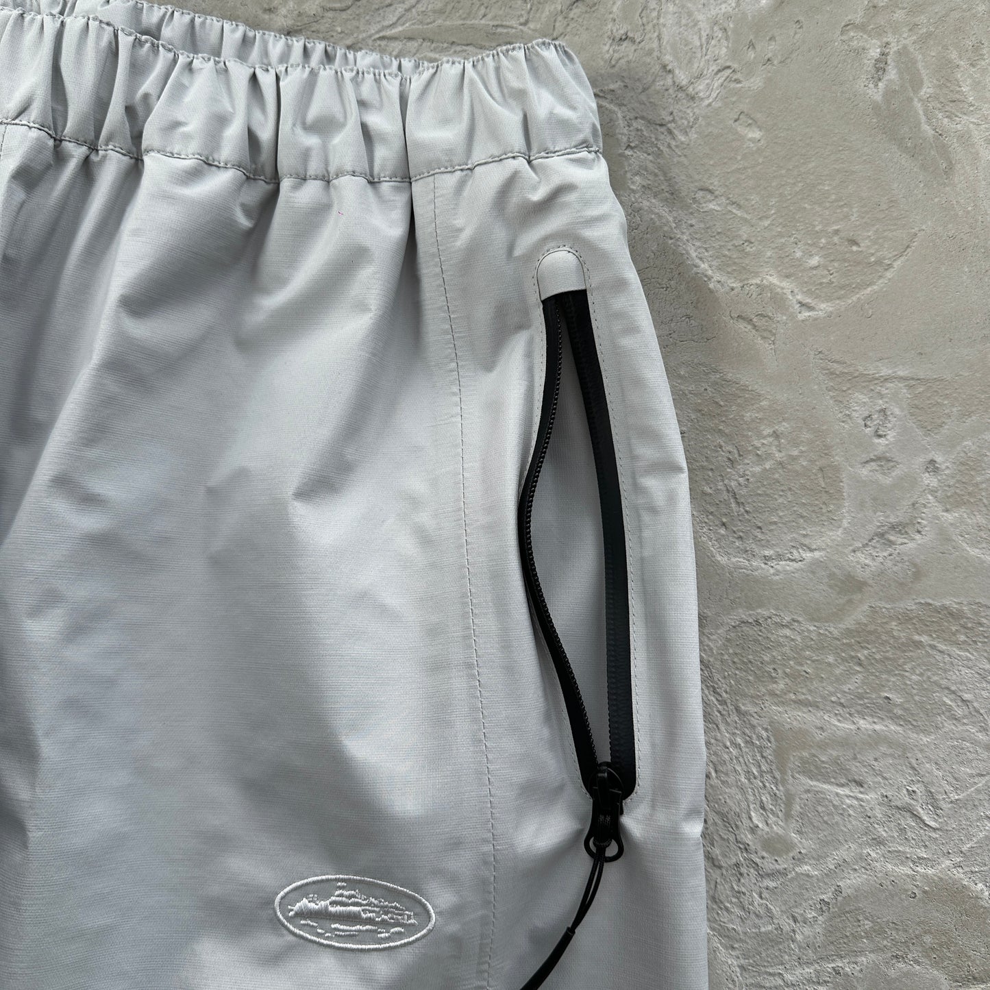 Corteiz Elitework Waterproof Shell Pant “Grey"
